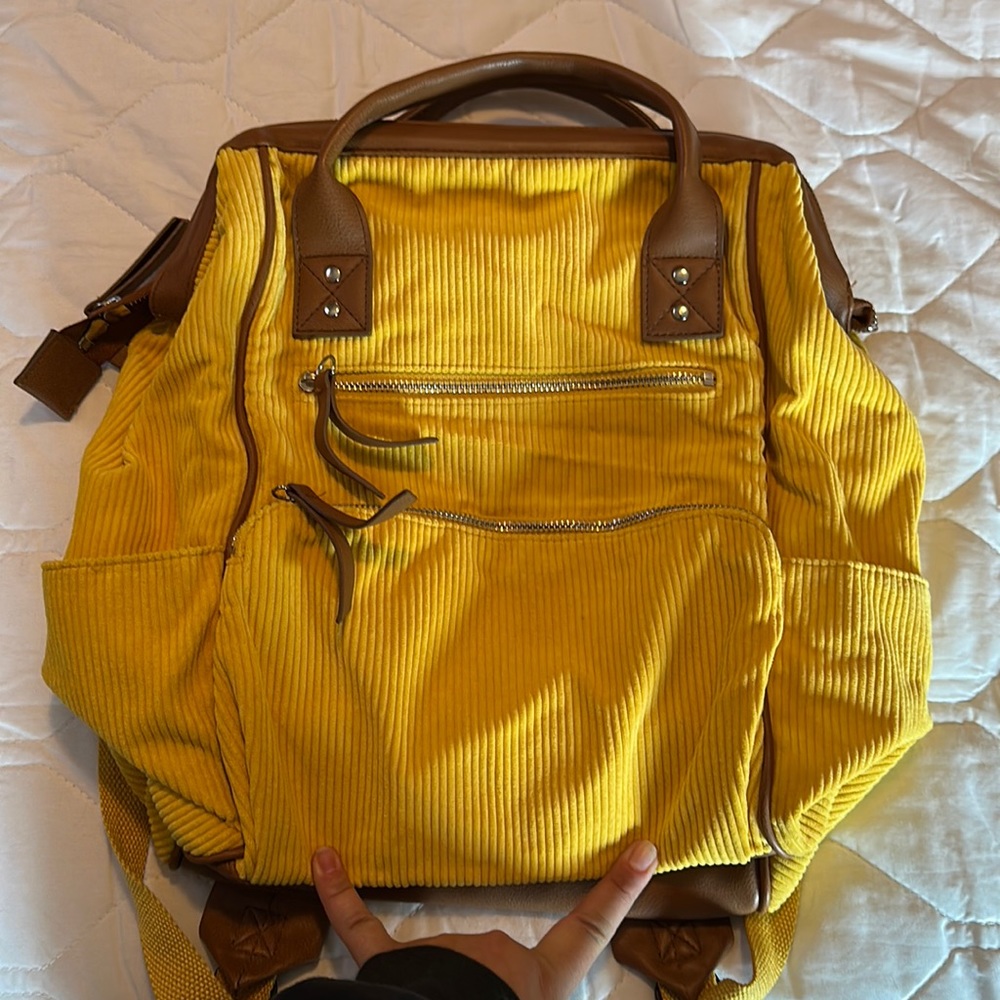 Yellow corduroy like backpack